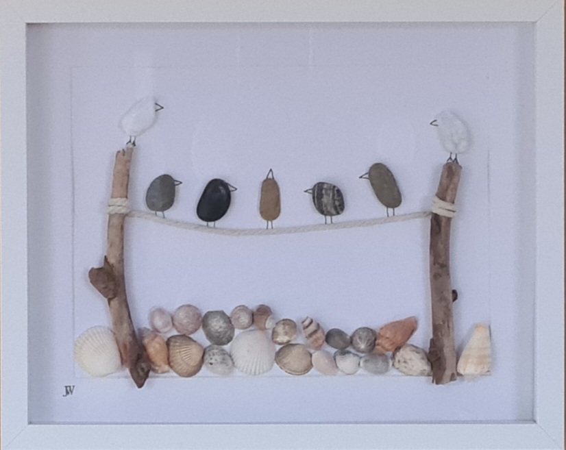 Vögel über dem Strand